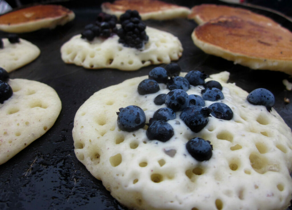 Close up of blueberry pancakes, a staple camping food.