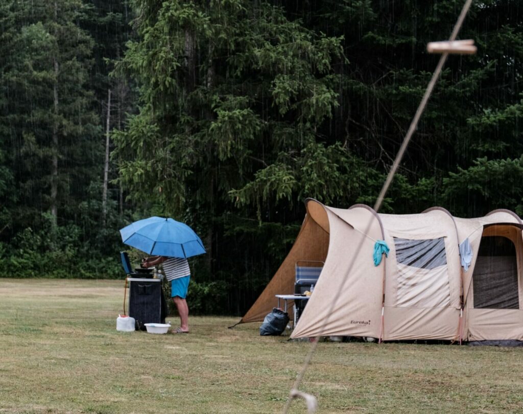 Rain is one of the many ways this persons camping trip is ruined. 