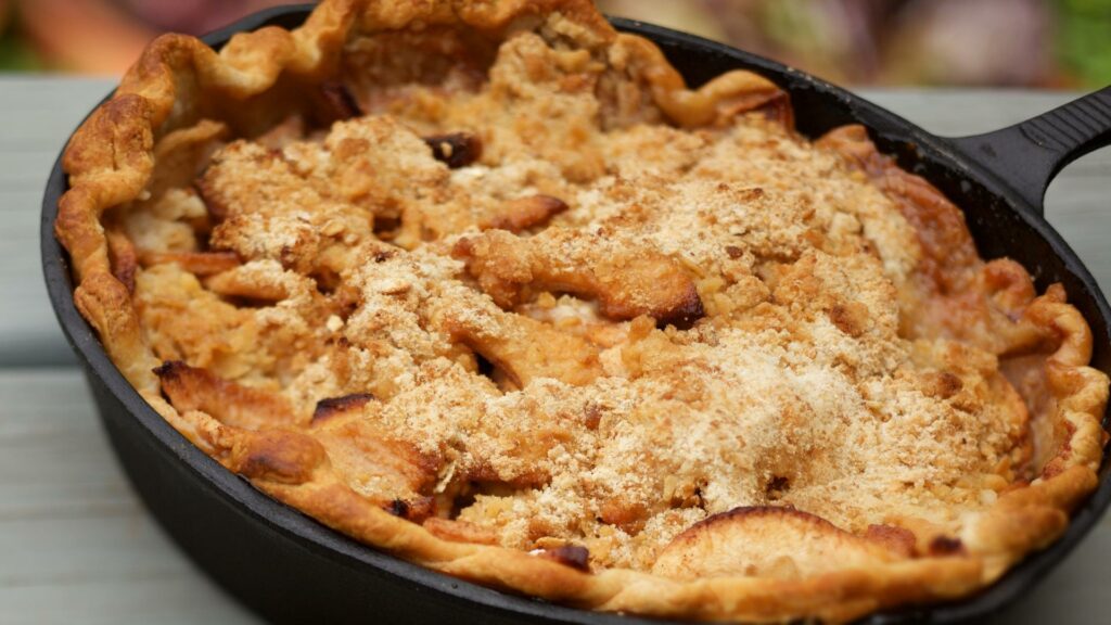 An apple pie in a cast iron pan