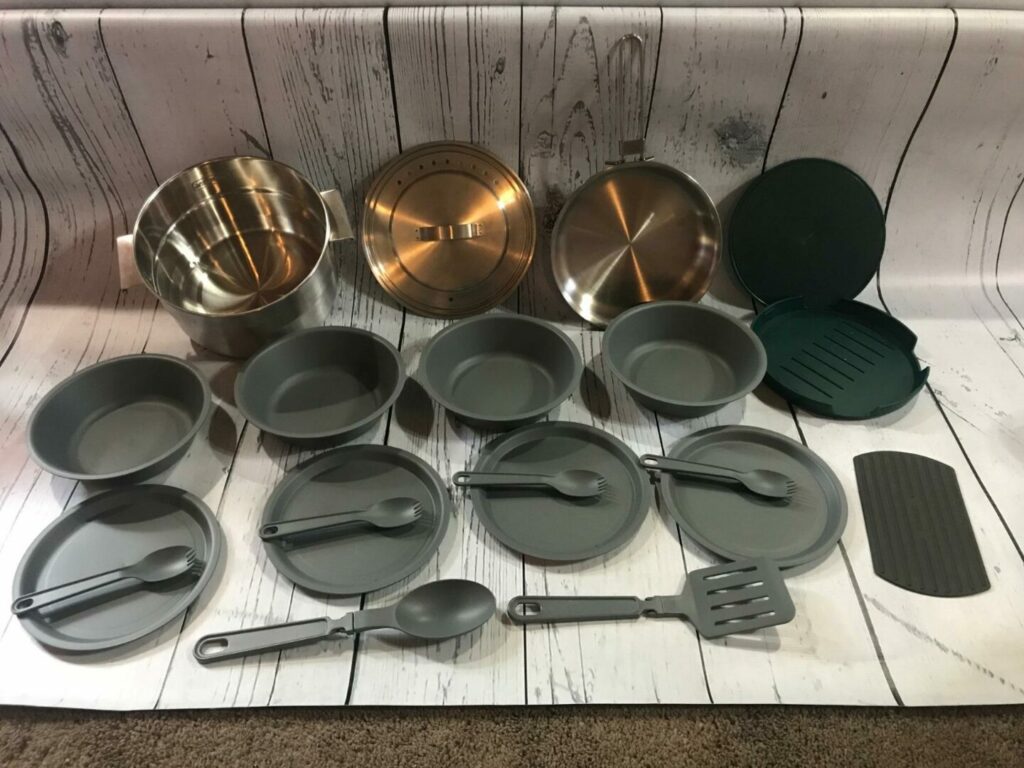 Full Stanley campfire cooking set laid out on table
