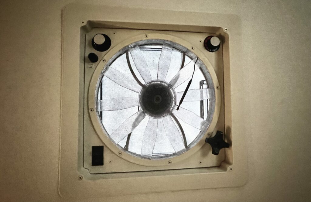 A dirty fantastic fan installed in an RV