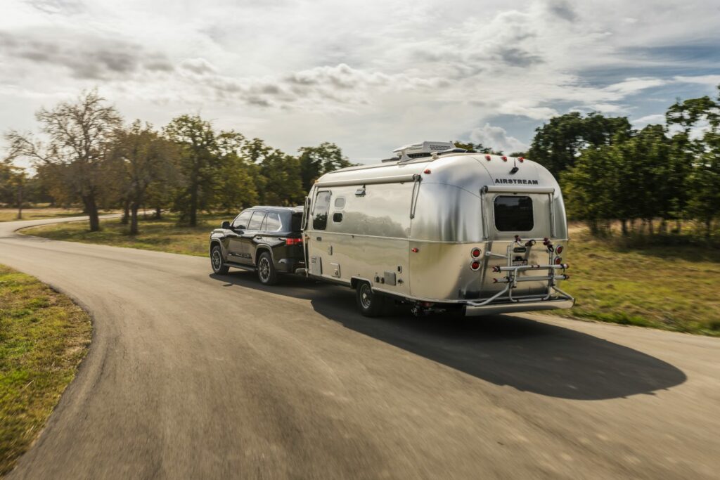 One of the best SUV for towing, a Toyota Sequoia towing an Airstream travel trailer