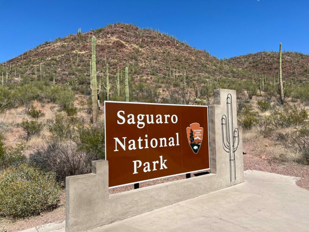 A Saguaro National Park sign as you enter the park to camp