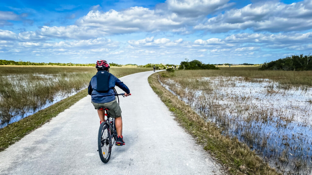 Man biking through Everglades National Park on the east coast