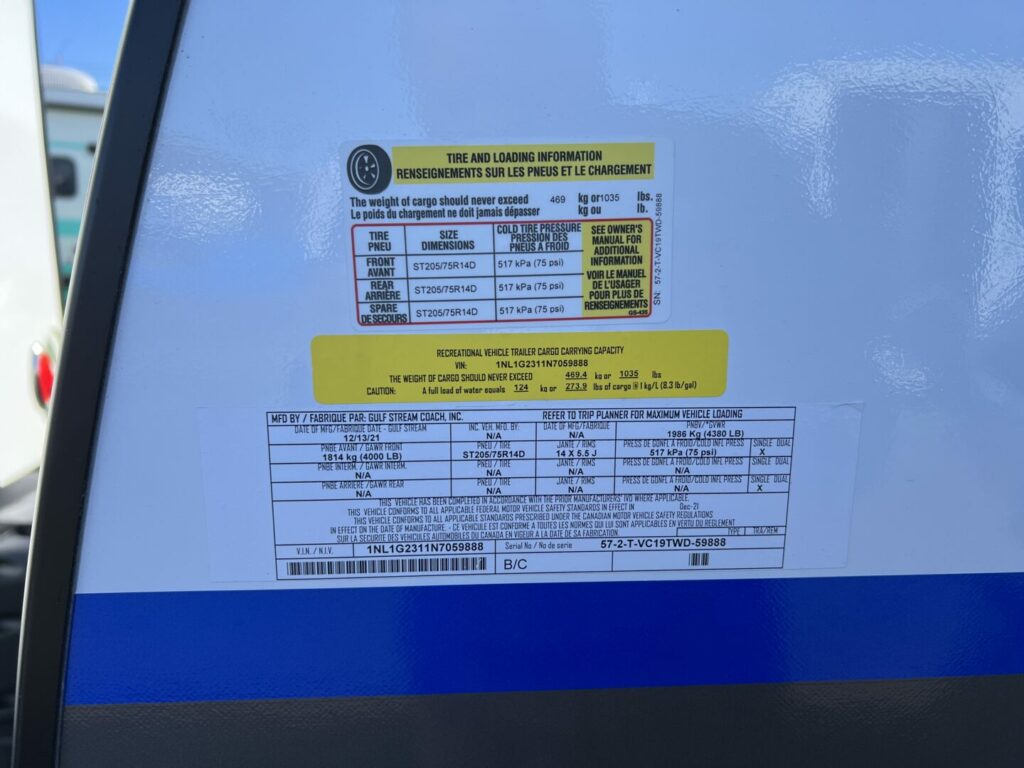 The sticker on the side of an RV showing the GVWR, CCC, and other weights and ratings
