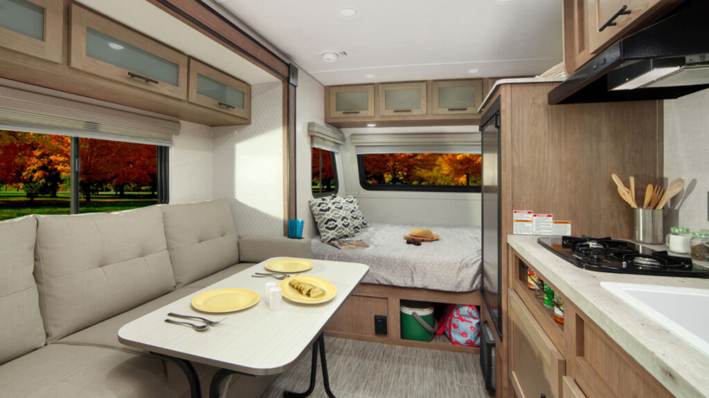 The inside living and bedroom area of a Nobo Camper