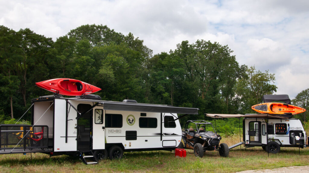 A Nobo Camper and a Nobo RV outside
