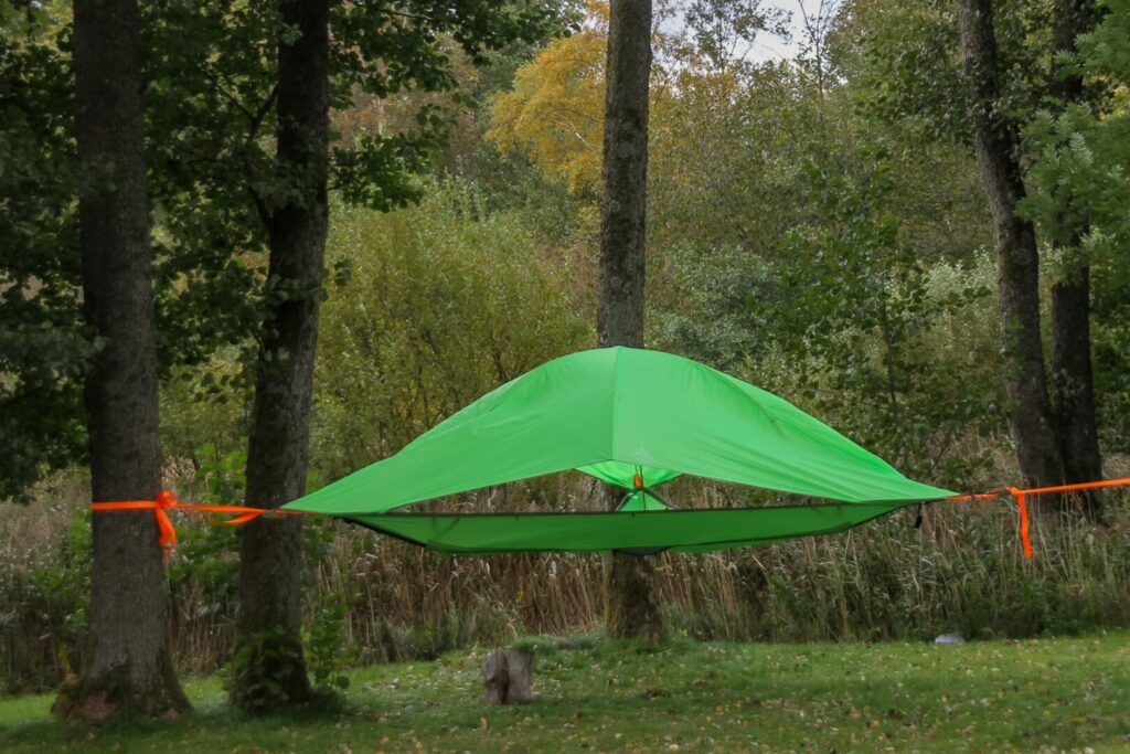 A hanging tent out in the woods