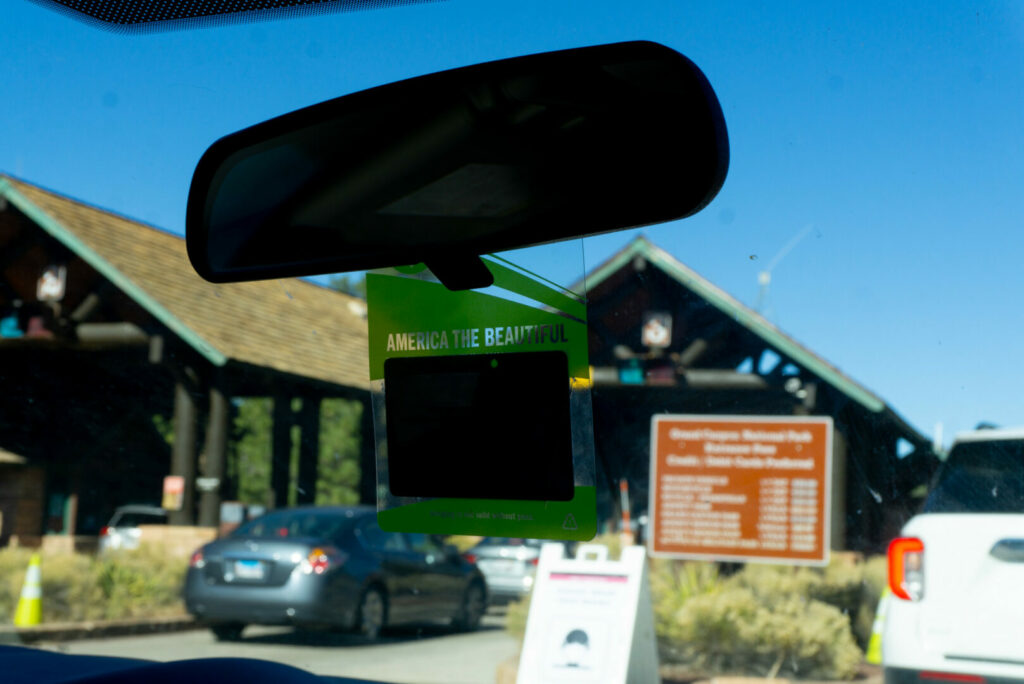 A car entering a national park using their seniors national park pass