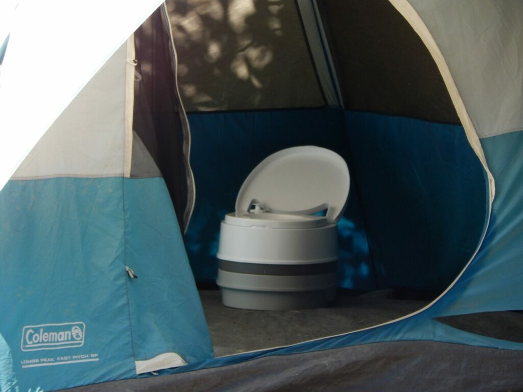 A portable toilet for camping inside a tent