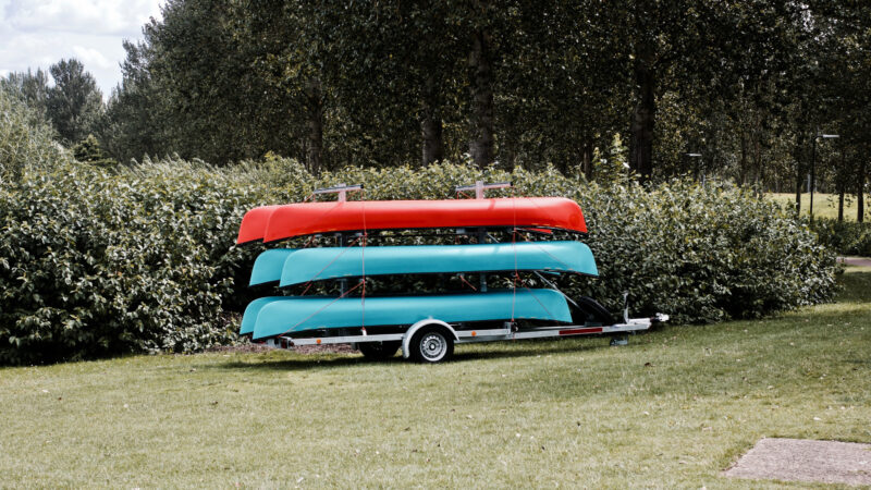 View of kayaks attached to a kayak trailer