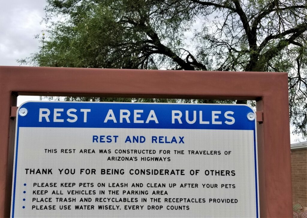 A close up of rest stop area rules, a place where you can sleep at while on the road 