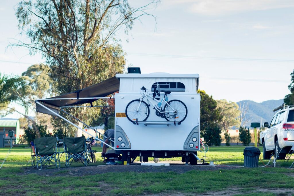 A bike rack attached to a pop up camper