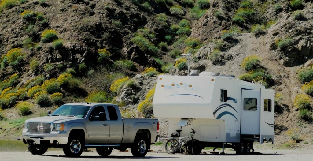 A truck towing an RV after finding out how much can my truck tow