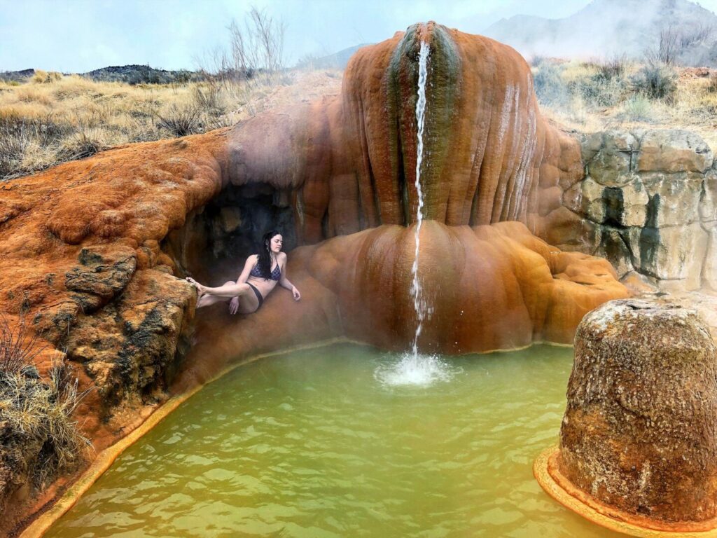 A girl at Mystic Hot Springs, one of the best hot springs in US
