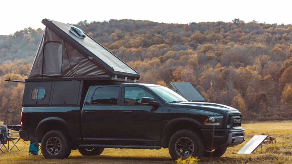 A treehouse camper attached to a truck