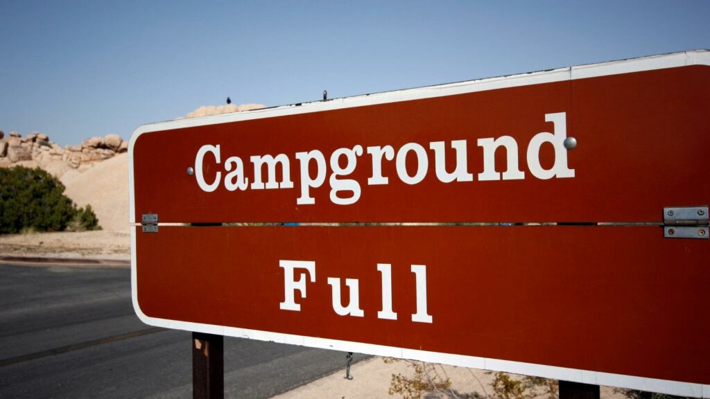 A campground full sign outside of a National Park.