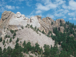 A view of mount rushmore, where many are convinced there is a hidden face