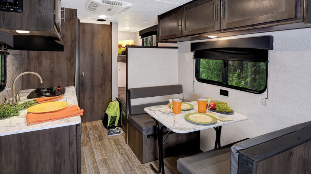 The inside kitchen area of a Viking travel trailer