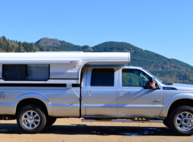 An Alaskan Camper attached to a truck