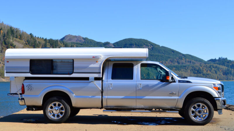 An Alaskan Camper attached to a truck