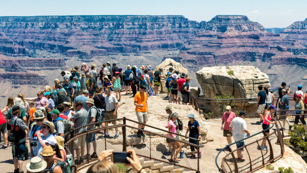 Very crowded overlook at Grand Canyon National Park in the summer 