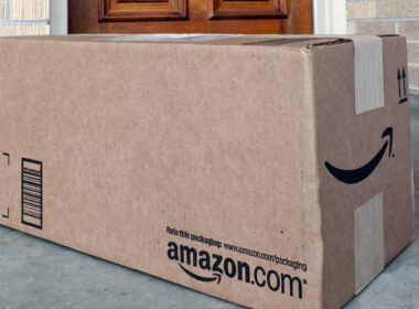 An Amazon box outside of someones home with RV parts inside