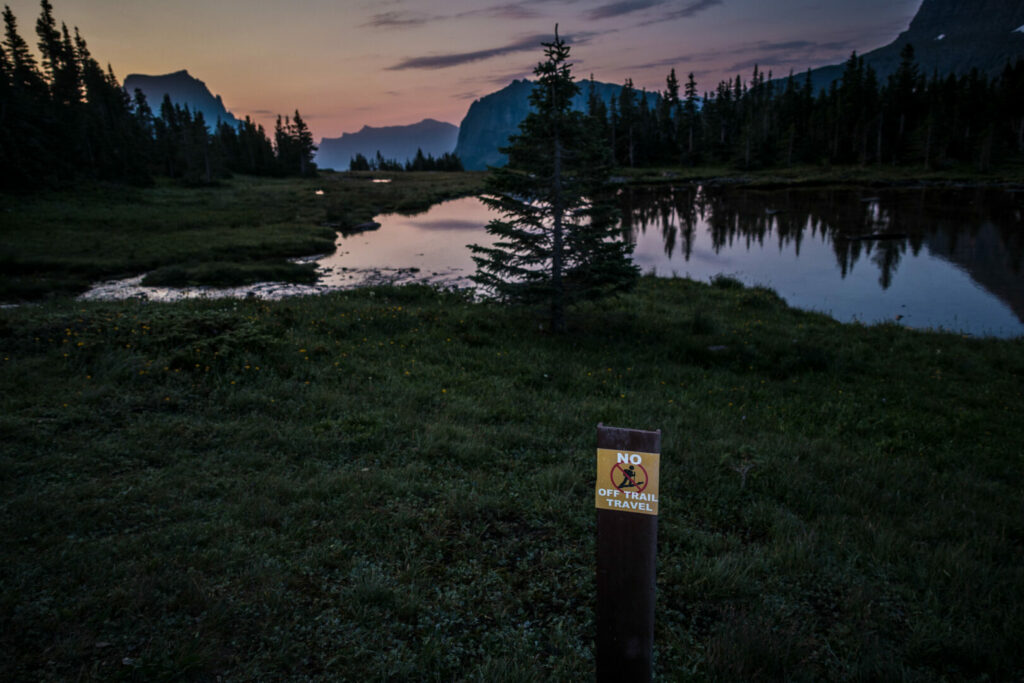No off-trail travel sign in glacier national park