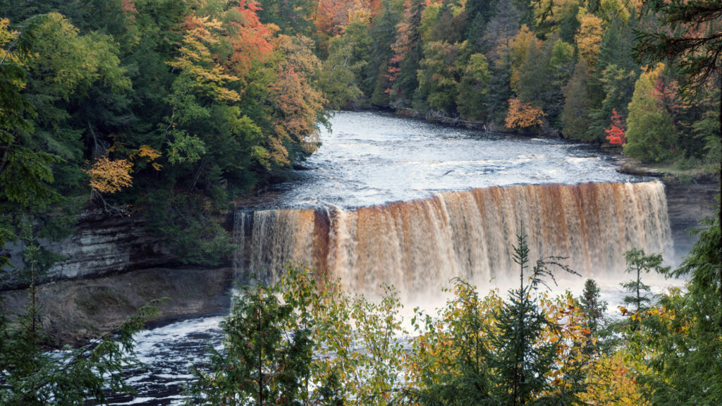 View of Tahquanmenon Falls State Park, a great location for fall camping in michigan