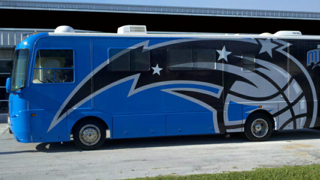 A motor coach with RV wrap done at Allstar Coaches