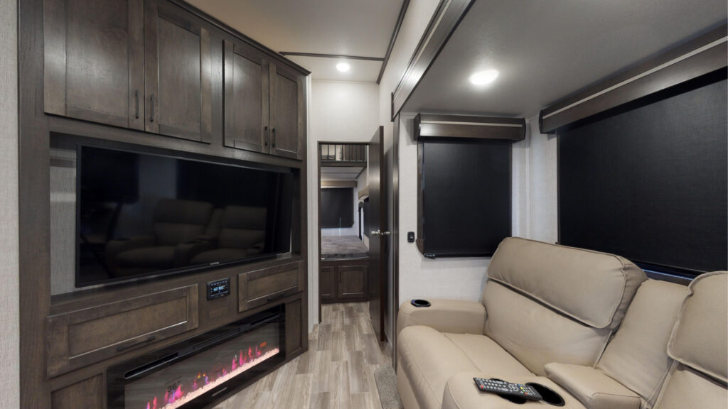 The entertainment center of the CrossRoads Crusier 3841FL front living fifth wheel