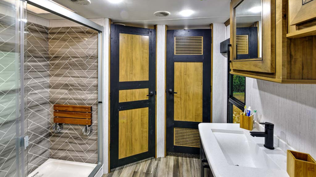 A spa bathroom inside a Heartland Landmark Lafayette front living fifth wheel