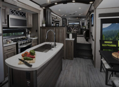 The kitchen and living area of a Jayco front living fifth wheel