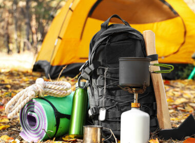 A campers belongings filled with items from a fall camping packing list