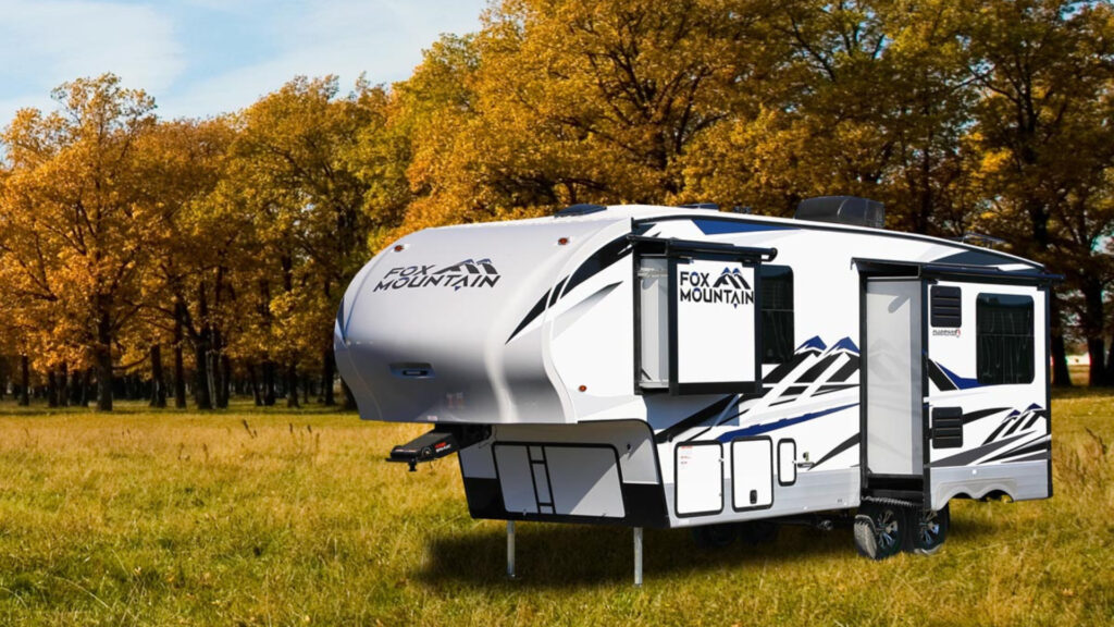 A Fox Mountain lightweight 265RDS parked outside that is known for being one of the best cold weather RVs