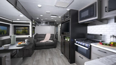 The kitchen and dining area inside a Jayco Jay Feather