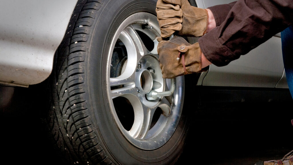 A mechanic changing their RV lug nut after finding the right size