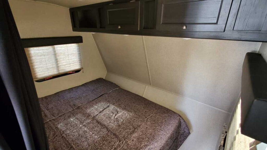 The bedroom area of an overnighter toy hauler