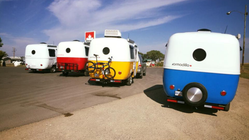 Multiple armadillo trailers parked outside