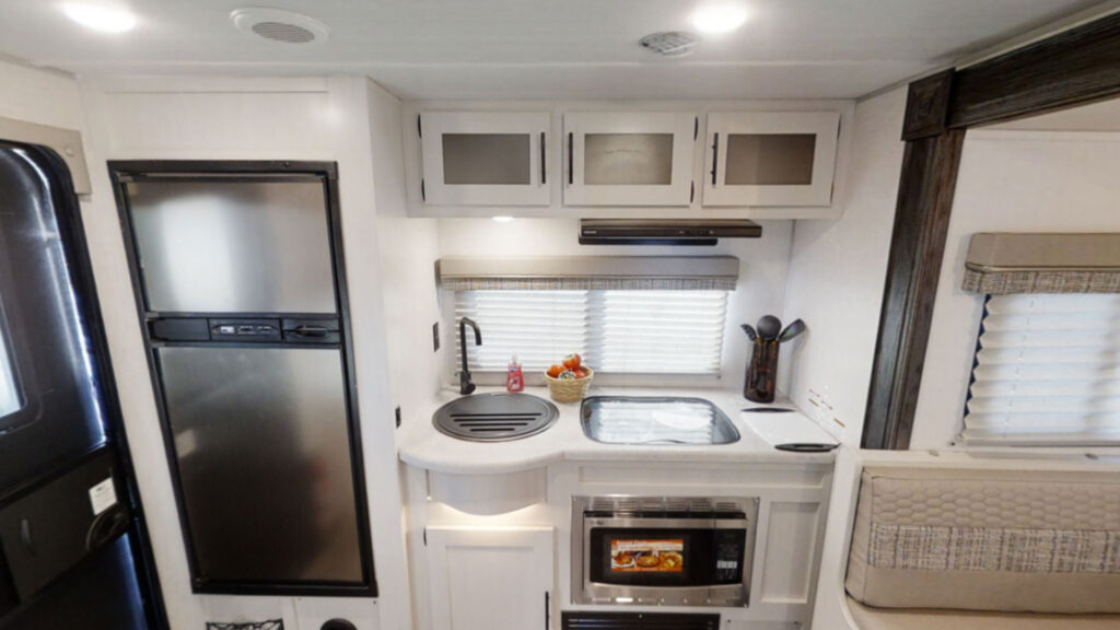 The rear kitchen inside a Forest River R-Pod RP-202 travel trailer
