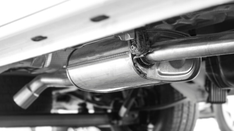 Close up of a catalytic converter using a catstrap
