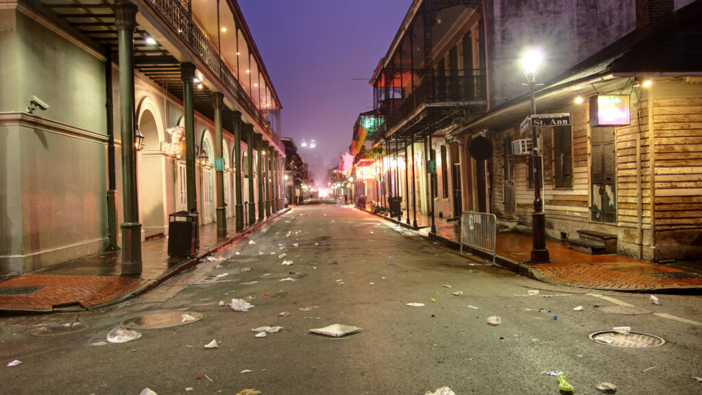 View of bourbon street new orleans louisiana with trash on it