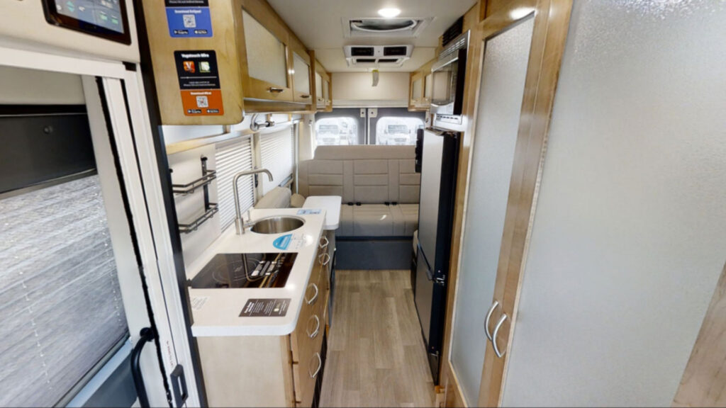 A Coachmen Beyond 22C camper van with bathroom