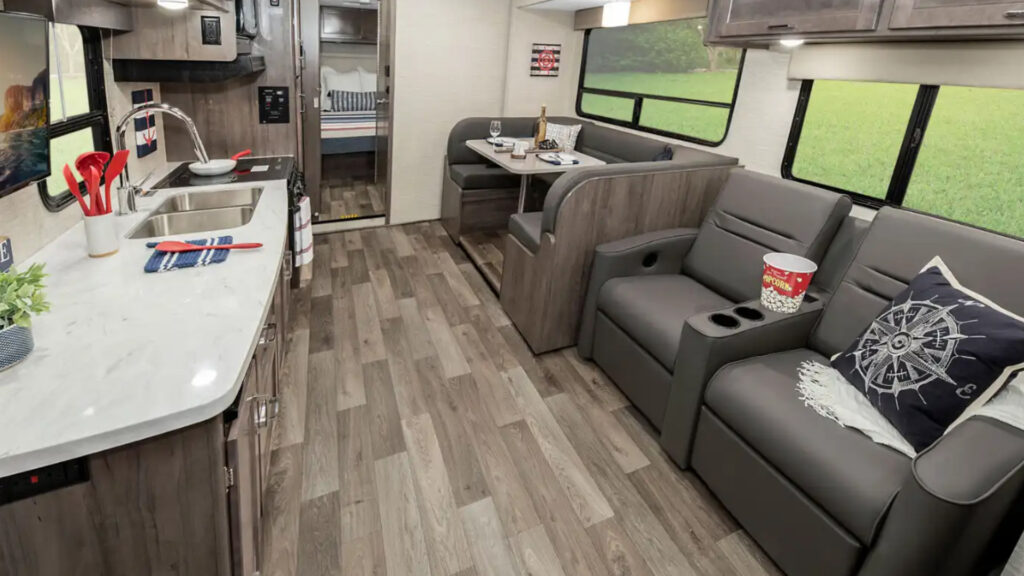 The kitchen and living area inside a Winnebago Minnie