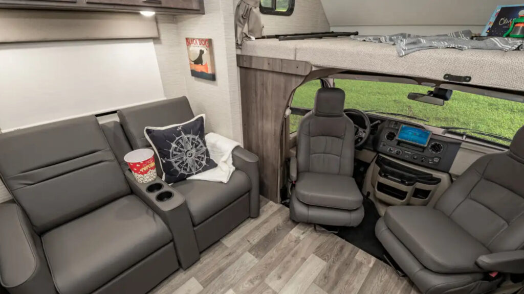 The front seat and loft area of a Winnebago Minnie