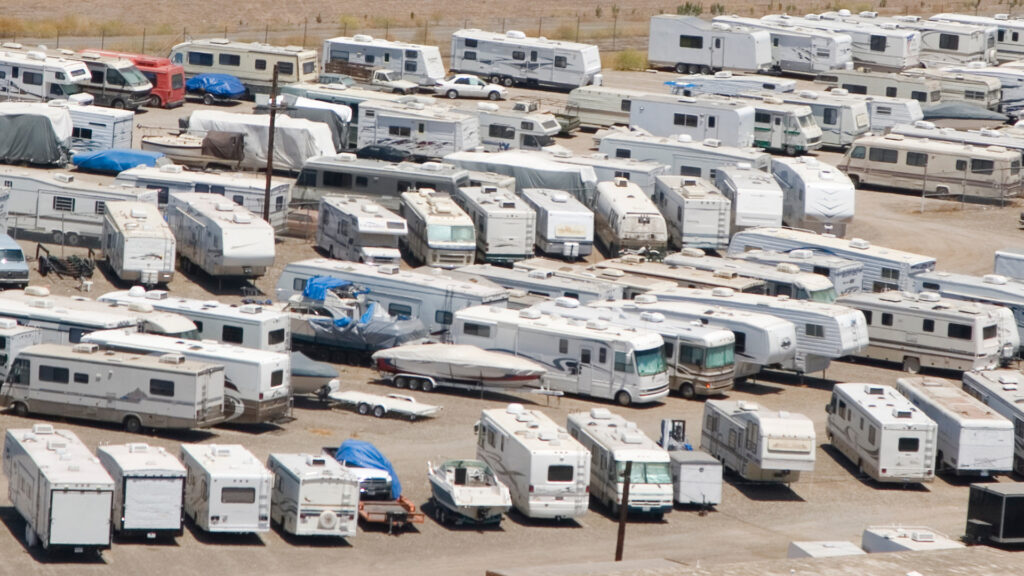 An RV lot with multiple RVs that are in need of an RV inspection