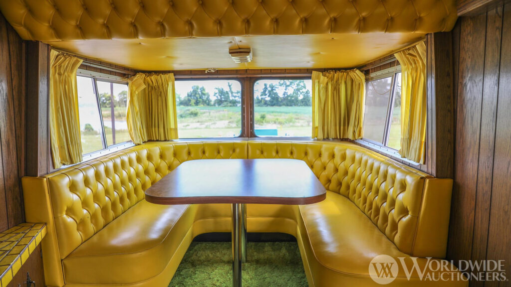 The dining area inside a camelot cruiser