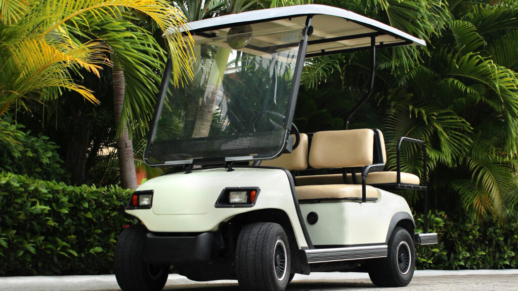 A parked golf cart with a registered title