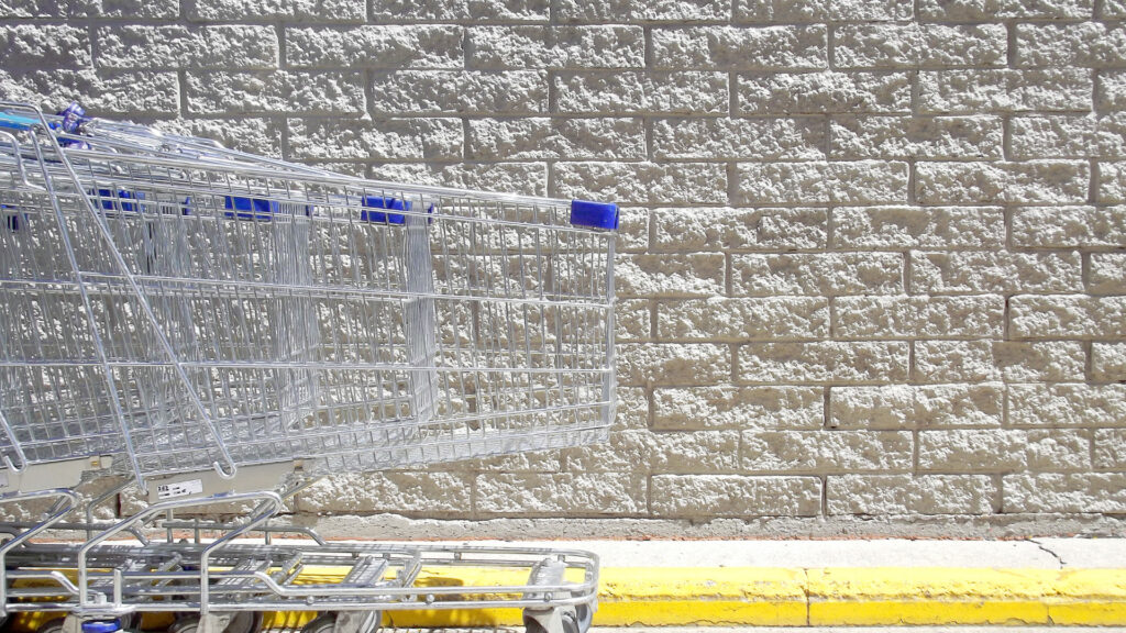 Walmart shopping carts outside the store, where many RVers will park for free overnight parking