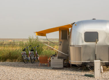 A camper with an aluminum siding outside